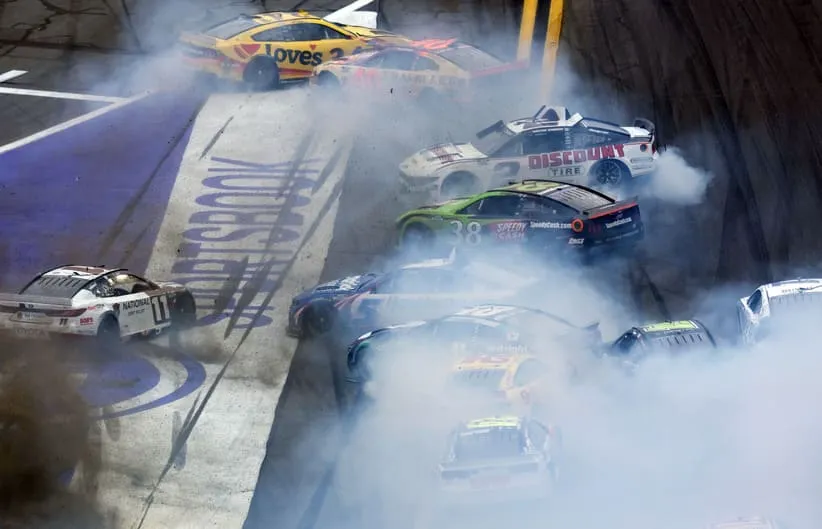 Feb 15, 2026; Daytona Beach, Florida, USA; NASCAR Cup Series drivers Justin Allgaier (40), Todd Gilliland (34), Austin Cindric (2), Zane Smith (38), Kyle Larson (5) and Alex Bowman (48) crash during the 68th running of the Daytona 500 at Daytona International Speedway.