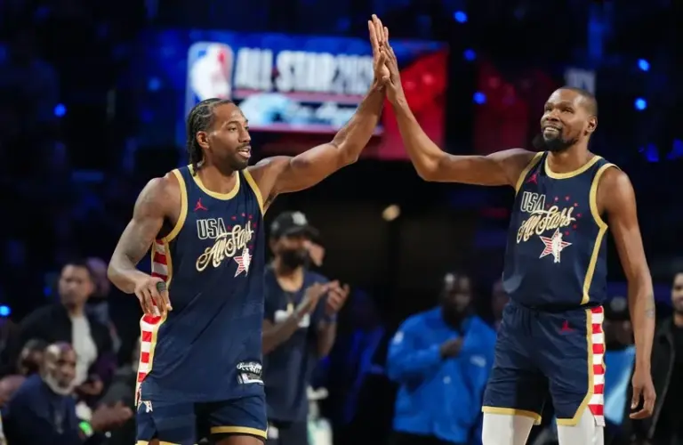 Team USA Stripes forward Kawhi Leonard (2) of the LA Clippers reacts after scoring a three pointer against Team World during the 75th NBA All-Star Game at Intuit Dome