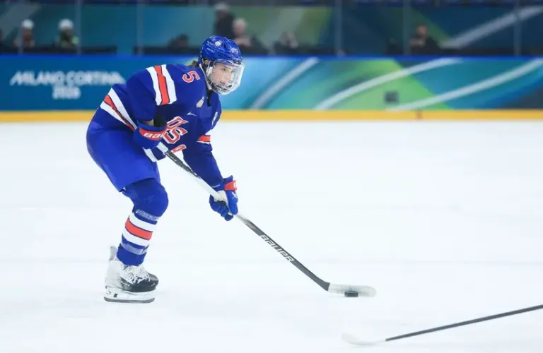 Megan Keller (5) of the United States looks to pas during the third period against Sweden in a women's ice hockey semifinal during the Milano Cortina 2026 Olympic Winter Games at Milano Santagiulia Ice Hockey Arena.