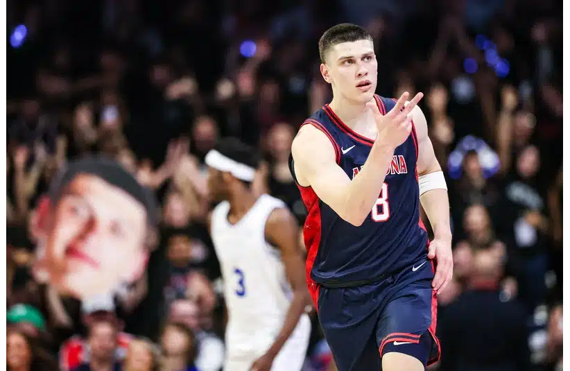 Wildcats Kharchenkov putting up a three