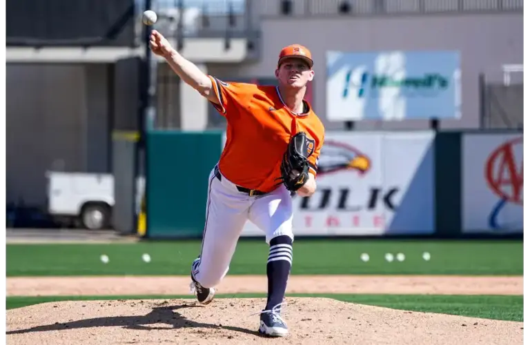 Tigers pitcher throwing a high velocity pitch in a bullpen session