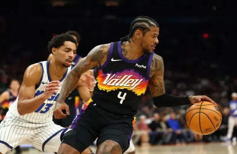 Phoenix Suns guard Jalen Green (4) against the Orlando Magic in the first half.
