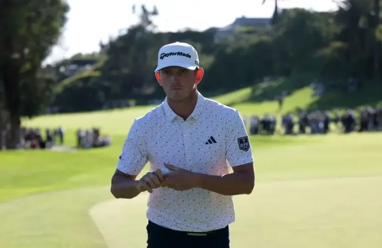 Jacob Bridgeman looks on after completing the 18th hole.