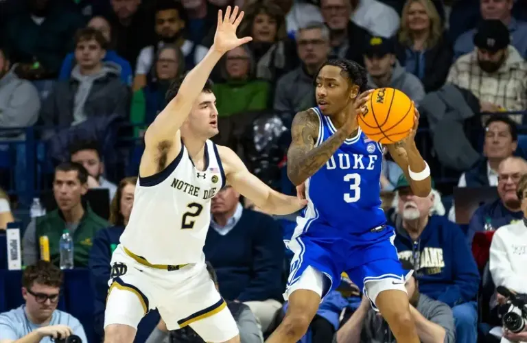 Duke Blue Devils guard Isaiah Evans (3) works against Notre Dame Fighting Irish guard Logan Imes (2)