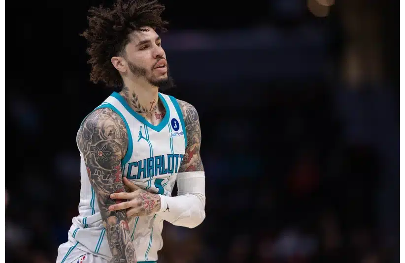 Charlotte Hornets guard LaMelo Ball celebrates a three point basket against the Portland Trail Blazers during the second half at Spectrum Center.