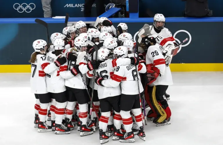 February 6, 2026, Milan, ITALY; Ivana Wey of Switzerland celebrates with teammates after scoring the winning penalty shootout goal against Czech Republic in women's ice hockey Group A play during the Milano Cortina 2026 Olympic Winter Games at Milano Santa Giulia Ice Hockey Arena.