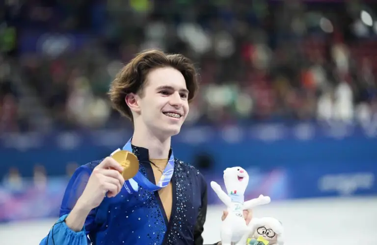 Feb 13, 2026; Milan, Italy; Mikhail Shaidorov of Kazakhstan reacts after winning gold in the men’s singles free program during the Milano Cortina 2026 Olympic Winter Games at Milano Ice Skating Arena.