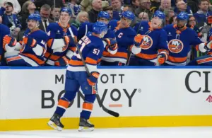 Mar 17, 2026; Toronto, Ontario, CAN; New York Islanders left wing Emil Heineman (51) celebrates at the bench after scoring a goal against the Toronto Maple Leafs during the second period at Scotiabank Arena.