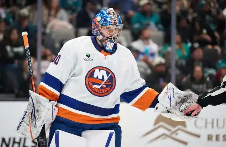 Mar 7, 2026; San Jose, California, USA; New York Islanders goaltender Ilya Sorokin (30) extends his glove with the puck for referee Graedy Hamilton (not pictured) during the second period against the San Jose Sharks at SAP Center at San Jose.