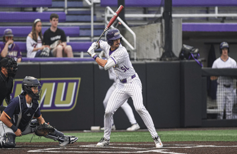 Josiah Seguin of James Madison Trying to hit on March 29.