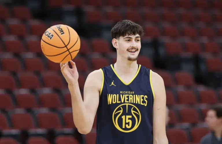 Mar 26, 2026; Chicago, IL, USA; Michigan Wolverines center Aday Mara (15) smiles during a practice session ahead of the Midwest regional of the men's 2026 NCAA Tournament at United Center.