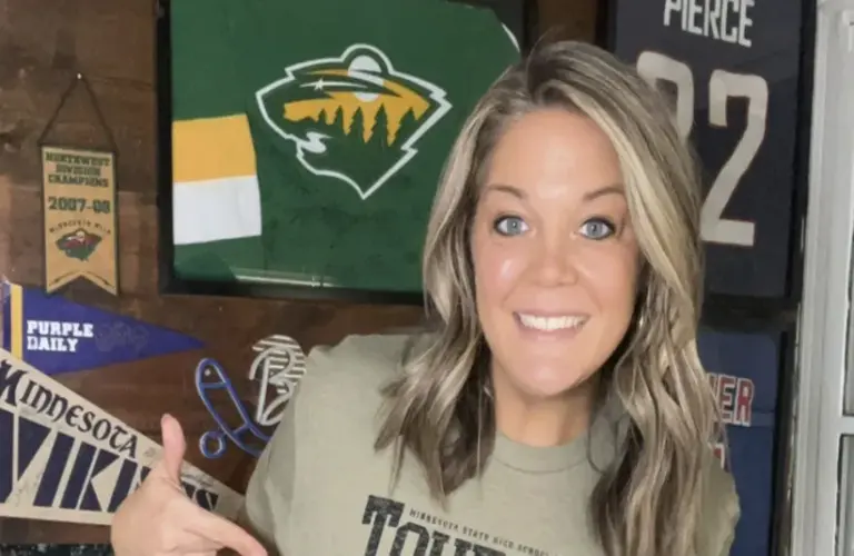 NHL.com Reporter Jessi Pierce In Front Of Minnesota Sports Memorabilia