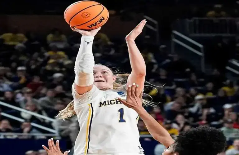 Michigan guard Olivia Olson (1) makes a jump shot against N.C. State guard Qadence Samuels (2) during the second half of NCAA Tournament Second Round at Crisler Center in Ann Arbor on Sunday, March 22, 2026.