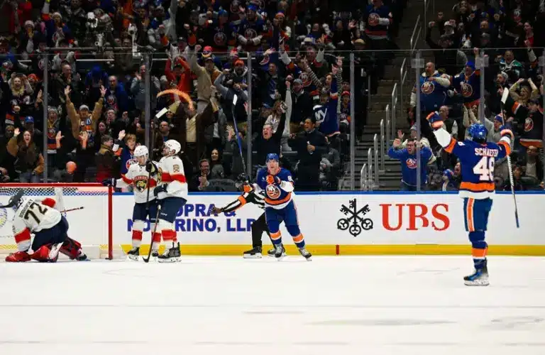 Mar 1, 2026; Elmont, New York, USA; New York Islanders defenseman Matthew Schaefer (48) celebrates his goal against the Florida Panthers during the first period at UBS Arena.