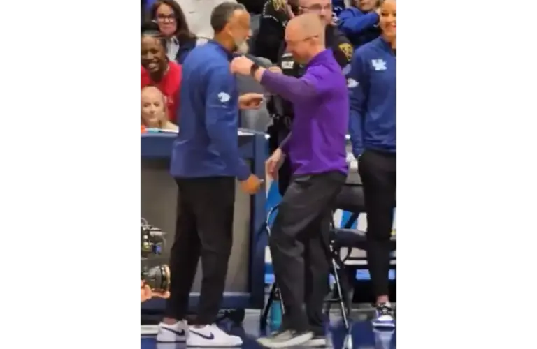 Kentucky Wildcats Head Coach Kenny Brooks (left) shakes hands pre-game with James Madison Head Coach Sean O'Regan