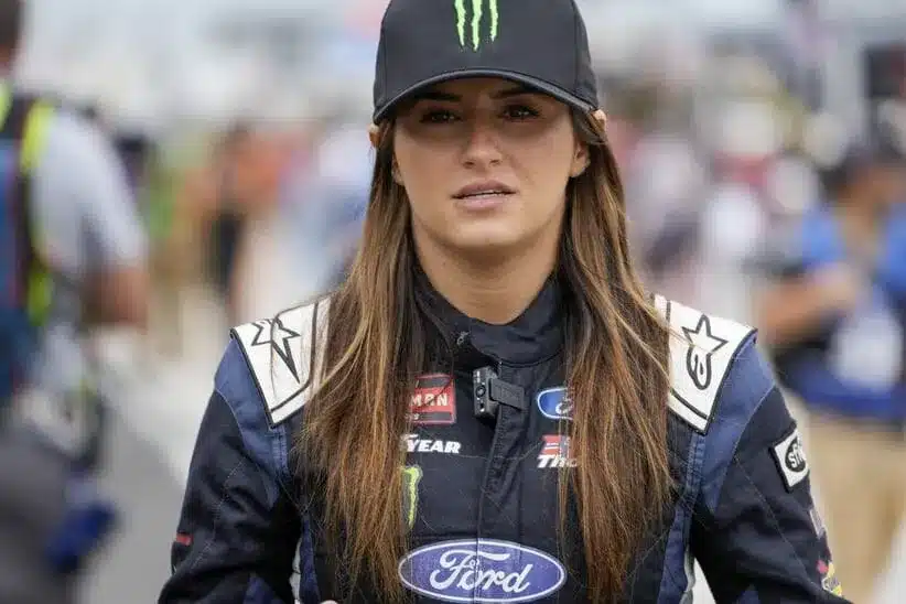 May 20, 2023; North Wilkesboro, North Carolina, USA; NASCAR Craftsman Truck Series driver Hailie Deegan (13) walks to her truck during the Tyson 250 at North Wilkesboro Speedway.