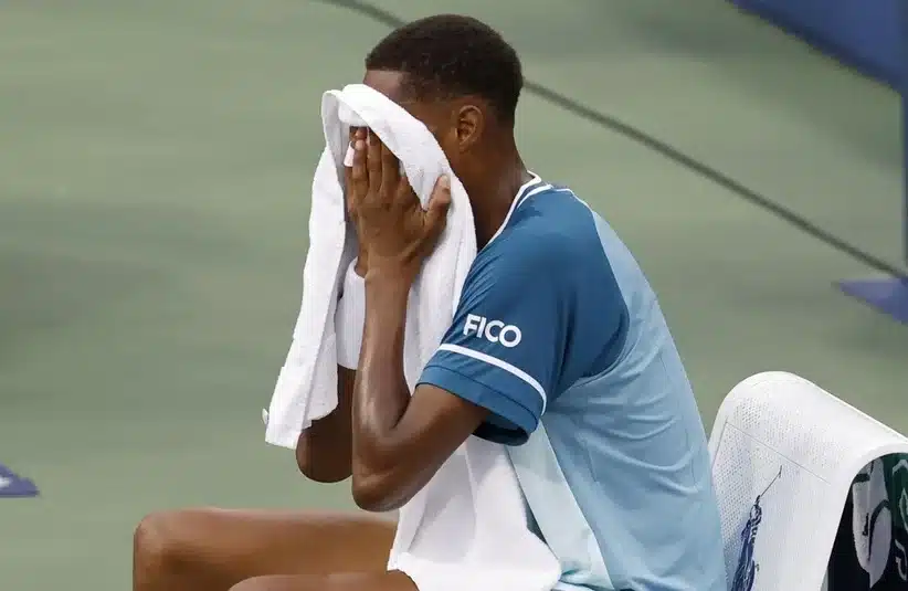 Eubanks covering face with towel
