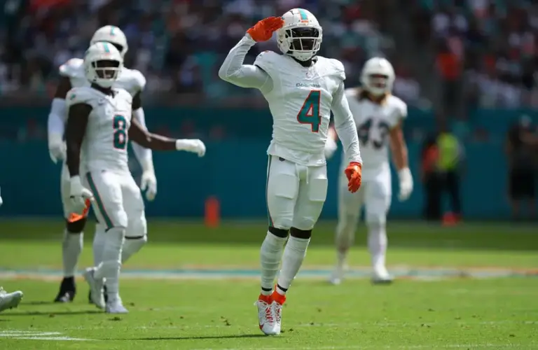 Miami Dolphins cornerback Kader Kohou (4) celebrates after a tackle against the New York Giants in the first half at Hard Rock Stadium.