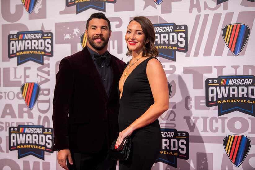 Bubba Wallace and his wife Amanda Wallace poses on the red carpet for the 2023 NASCAR Awards Banquet at the Music City Center in Nashville, Tenn., Thursday, Nov. 30, 2023.