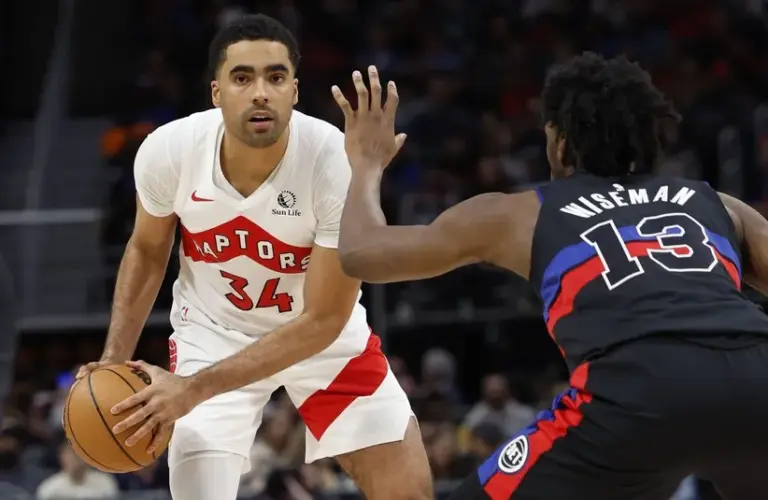 Toronto Raptors center Jontay Porter (34) is defended