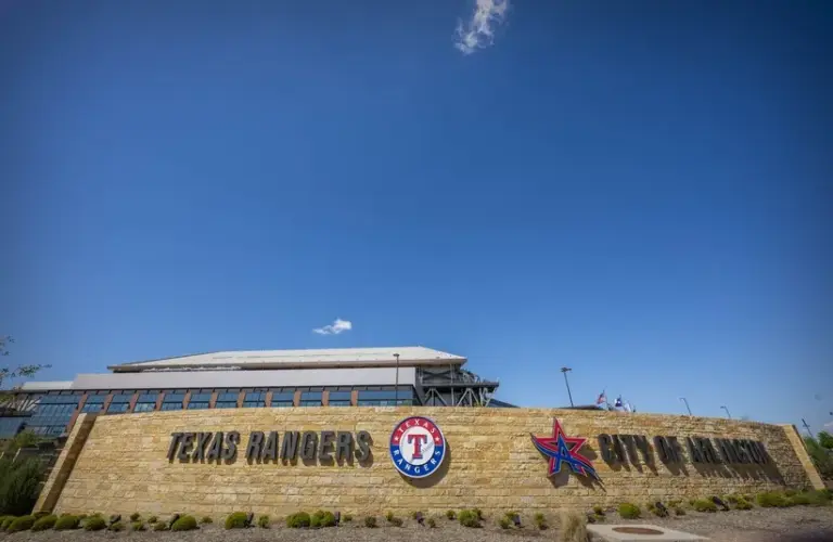 A view of the Texas Rangers logo and the City of Arlington logo