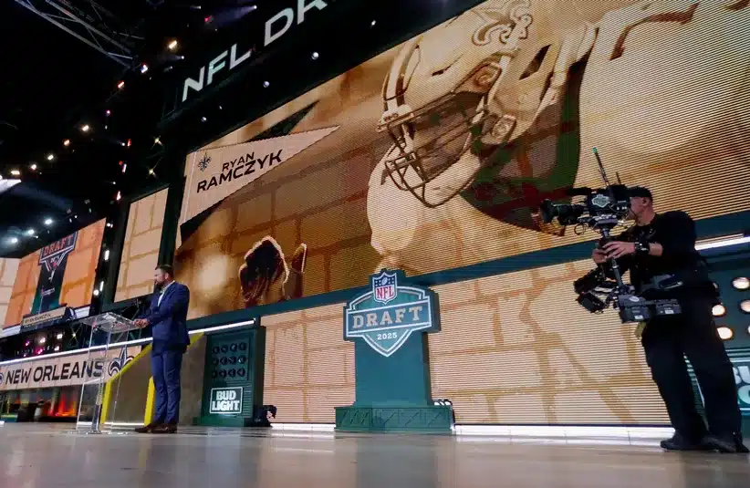 New Orleans Saints tackle Ryan Ramczyk announces the team’s selection with the 40th overall pick during the 2025 NFL Draft