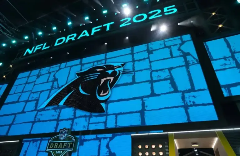 The Carolina Panthers logo is projected on the video board during the 2025 NFL Draft