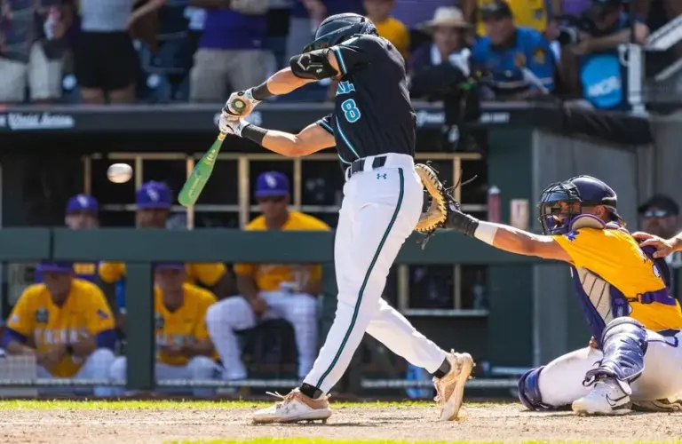 Coastal Carolina Chanticleers designated hitter Dean Mihos (8) hits a single