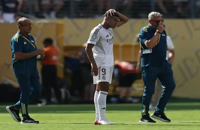 Mbappé scratching his head