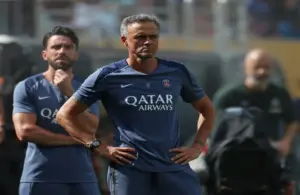 Luis Enrique with hands on hips