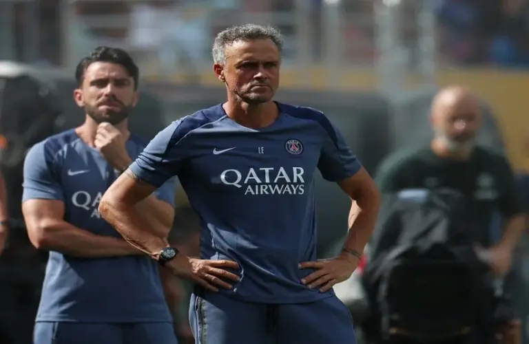 Luis Enrique with hands on hips