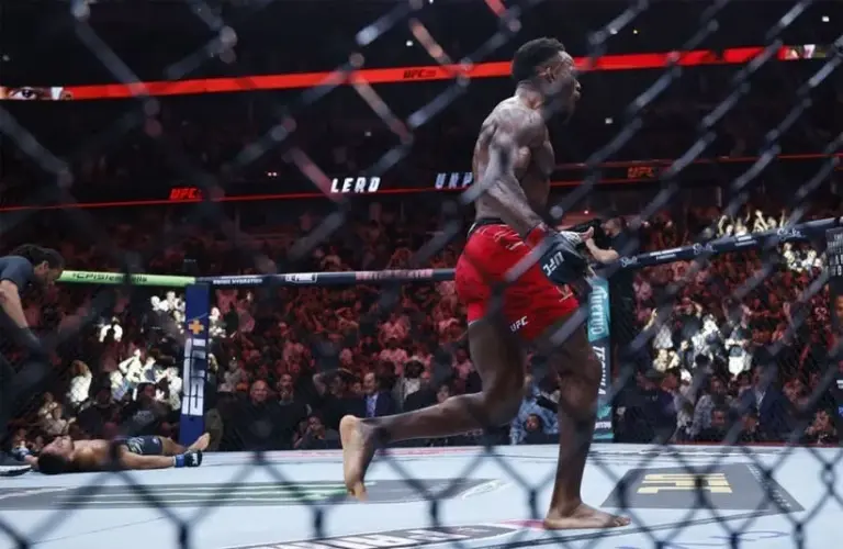Lerone Murphy (red gloves) reacts after the fight against Aaron Pico (blue gloves)
