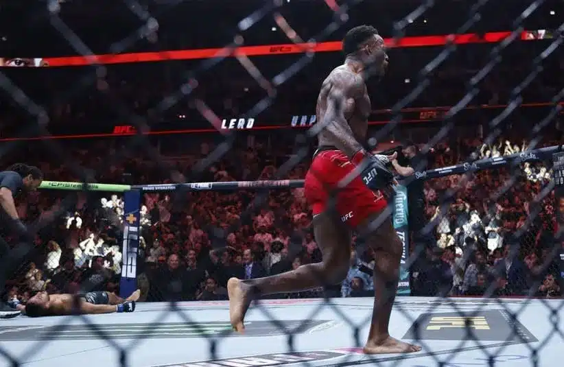 Lerone Murphy (red gloves) reacts after the fight against Aaron Pico (blue gloves)