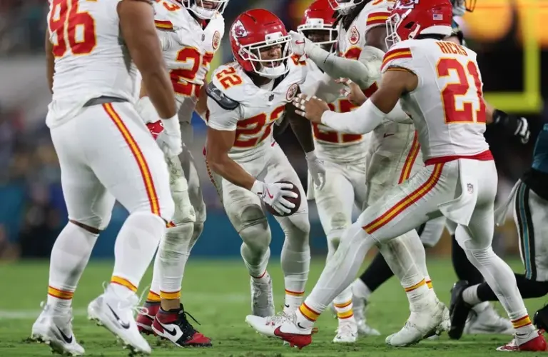 Kansas City Chiefs cornerback Trent McDuffie (22) celebrates after an interception