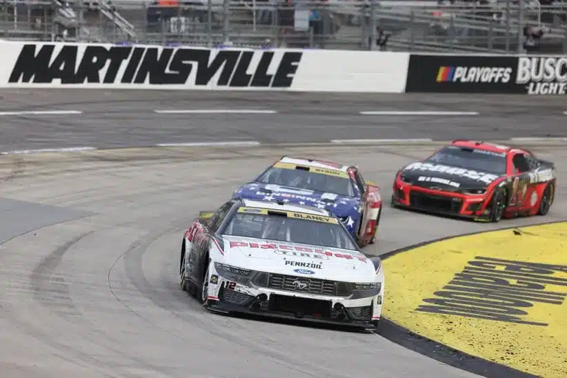 Oct 26, 2025; Martinsville, Virginia, USA; NASCAR Cup Series driver Ryan Blaney (12) leads during stage three of the Xfinity 500 at Martinsville Speedway.