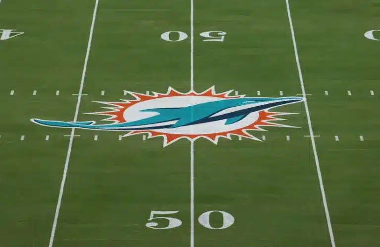 The Miami Dolphins logo is seen at midfield