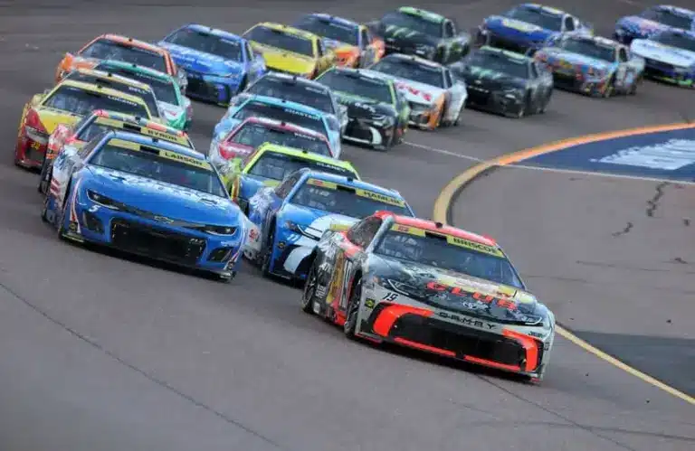 Nov 2, 2025; Avondale, Arizona, USA; NASCAR Cup Series driver Chase Starting Lineup; Briscoe (19) alongside Kyle Larson (5) during the NASCAR Championship race at Phoenix Raceway.