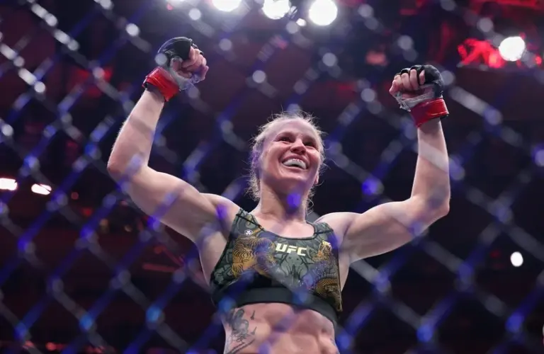 Shevchenko celebrates after winning the fight