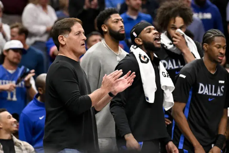 Nov 19, 2025; Dallas, Texas, USA; (from left) Dallas Mavericks minority owner Mark Cuban and forward Anthony Davis (center) and guard Jaden Hardy (right) watch the game against the New York Knicks during the second half at the American Airlines Center.