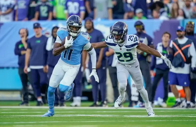 Tennessee Titans wide receiver Van Jefferson (11) catches and runs