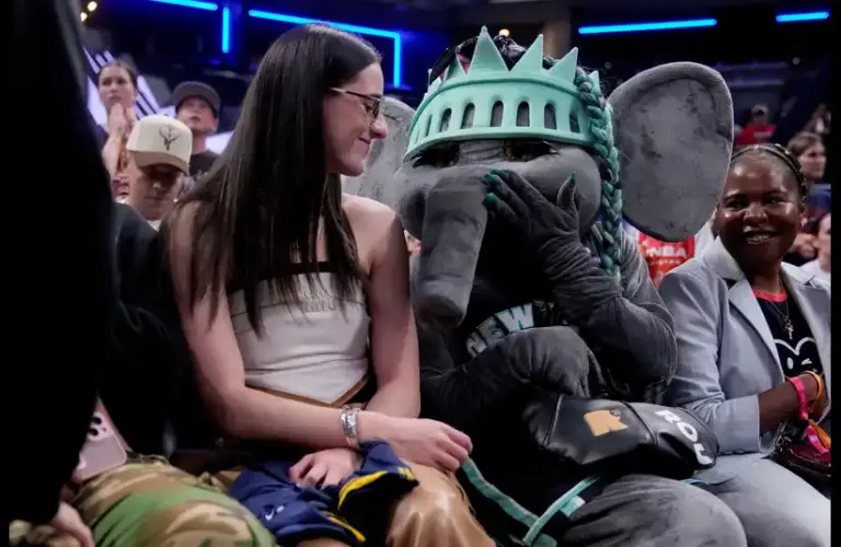 WNBA superstar Caitlin Clark and NY Liberty Mascot having fun