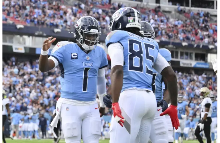Chig Okonkwo celebrating with Cam Ward