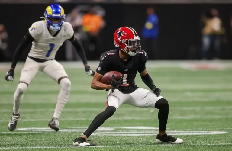 Atlanta Falcons wide receiver Darnell Mooney (1) runs after a catch