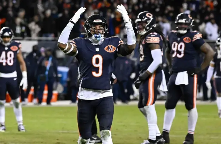 Chicago Bears safety Jaquan Brisker (9) reacts after a flag