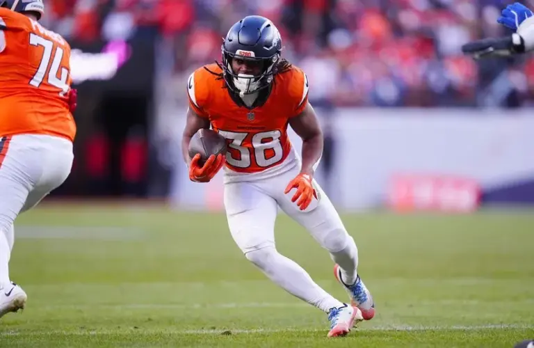 Denver Broncos running back Jaleel McLaughlin (38) runs