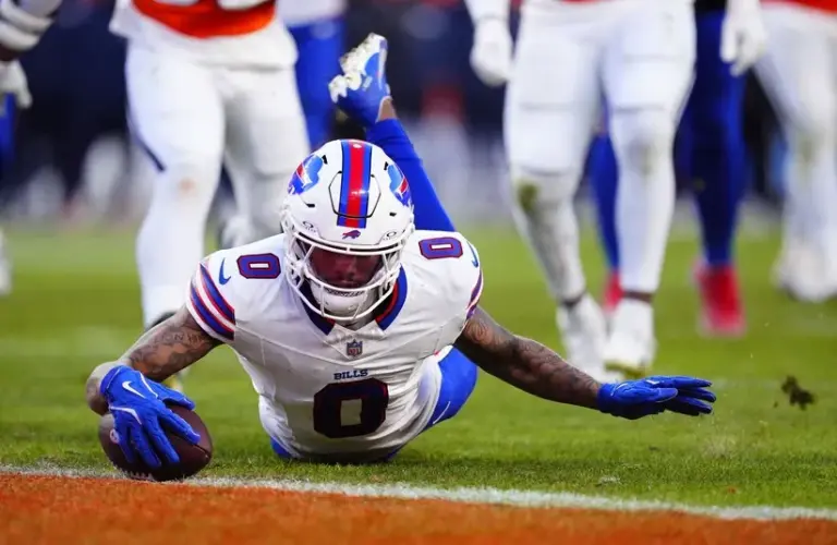 Buffalo Bills wide receiver Keon Coleman (0) scores a touchdown