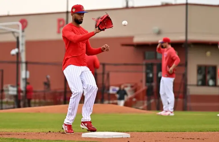 Philadelphia Phillies pitcher Cristopher Sanchez (61) runs a drill during spring training