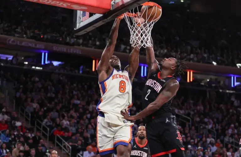New York, New York, USA; New York Knicks forward Og Anunoby (8) dunks past Houston Rockets forward Dorian Finney-Smith (2)