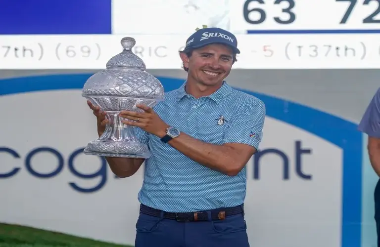 Nico Echavarria poses with the trophy after winning the Cognizant Classic
