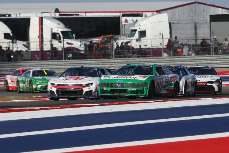 COTA; Mar 1, 2026; Austin, Texas, USA; NASCAR Cup Series driver Ryan Preece (60) and NASCAR Cup Series driver Ty Dillon (10) go through turn 15 during the NASCAR Cup Series Duramax Texas Grand Prix Powered by RelaDyne at Circuit of the Americas.